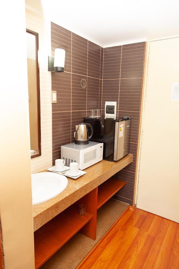 טאקנה Holiday Suites מראה חיצוני תמונה